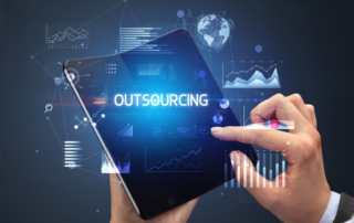 A close up of hands touching a tablet to symbolize business process outsourcing software capabilities