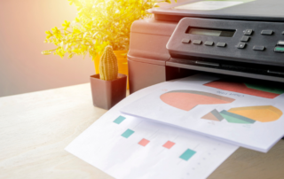 An office printer to signify Managed Print Services