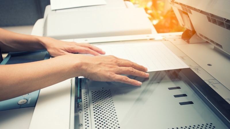 Conversion services Copier scanning a document