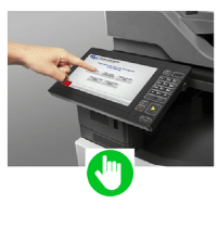 Close up of a woman using the interface on an office copier
