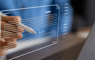 Close up of a person signing an icon image of a document symbolizing digital forms.